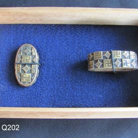 Shakudo and Brass Fuchi Kashira: Manji — 7 of 10