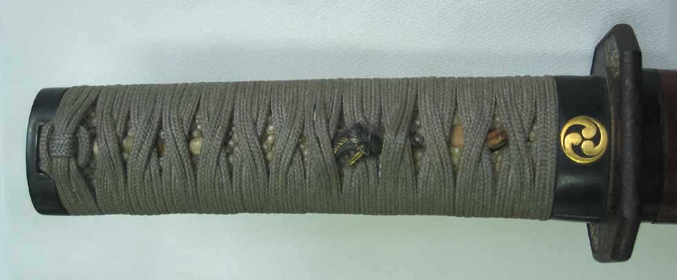Tanto Koshirae: Brown Lacquered Mounting with Mitsudomoe Crest — 3 of 15