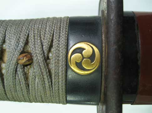 Tanto Koshirae: Brown Lacquered Mounting with Mitsudomoe Crest — 7 of 15