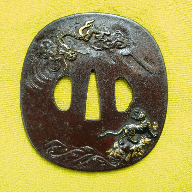 Dragon and Tiger Design High Relief Inlay Iron Tsuba — 1 of 3